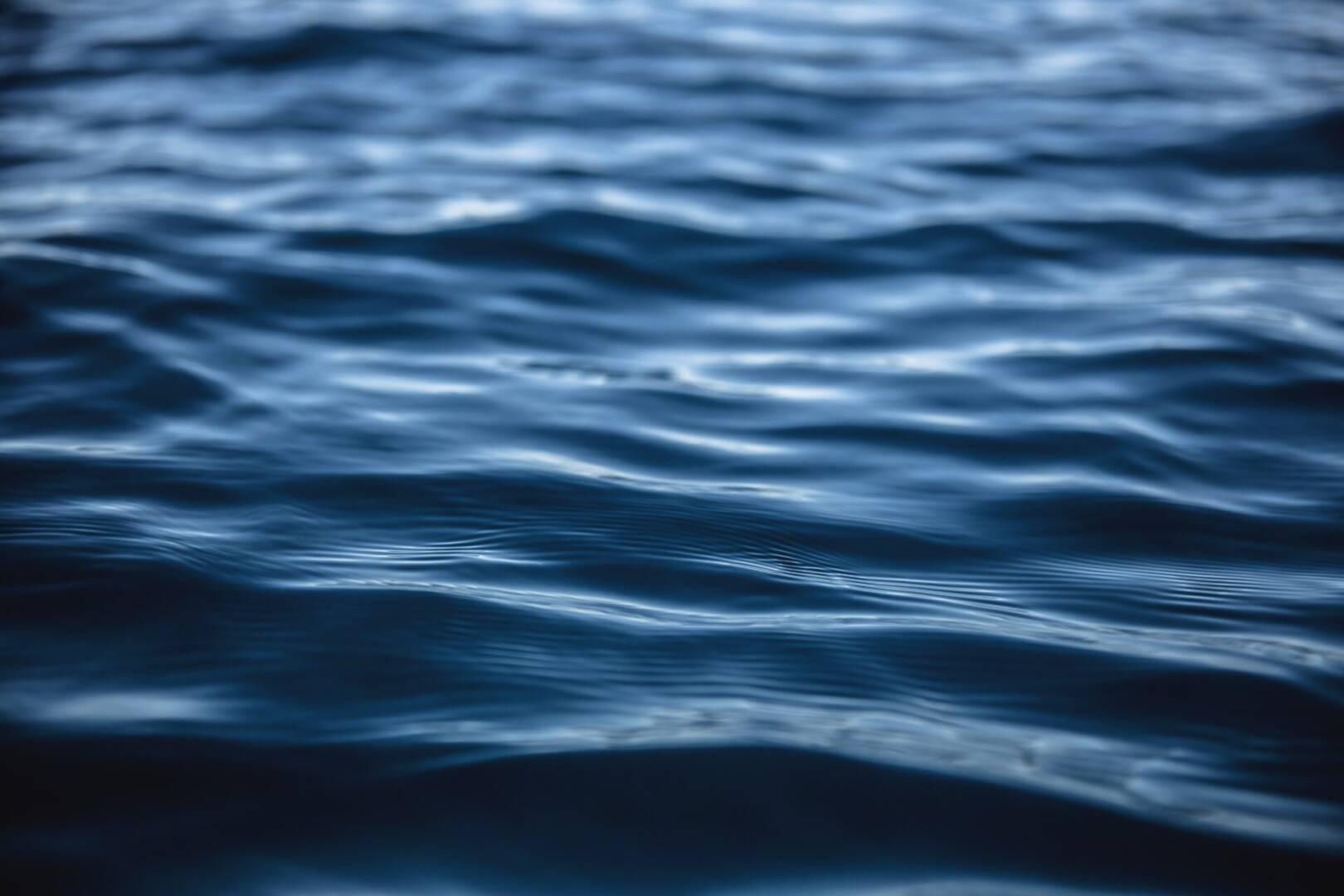 Beautiful shot of a body of water with sea waves - great for a cool background or wallpaper
